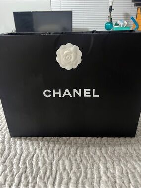 CHANEL Black Shopping Bag with White Camellia Accent